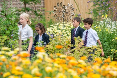 Children walking through the secret garden at Great Walstead